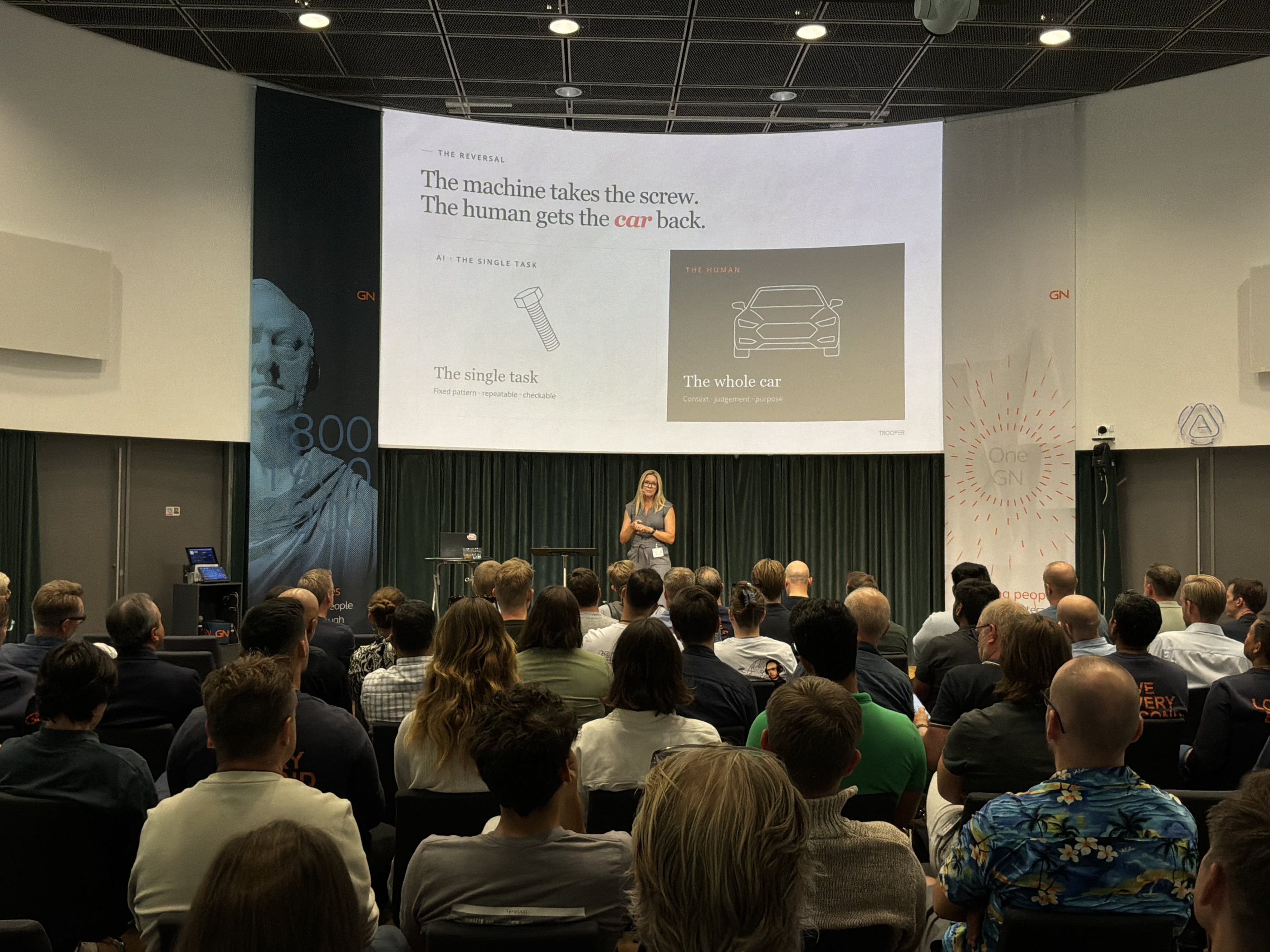 Loa Brix giving a keynote on AI to a full room